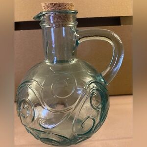 Glass ball style corked storage great for homemade dressings or herbs or grains